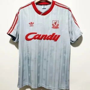 Liverpool retro bortatröja 1988/89 i ljusgrått med röd krage, röda ränder på axlarna och Candy-tryck, med eget namn och nummer, framsida