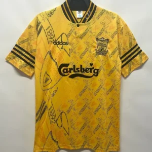 Liverpool retro bortatröja 1994/96 i gult med svart och orange mönster, Carlsberg-tryck och eget namn och nummer, framsida
